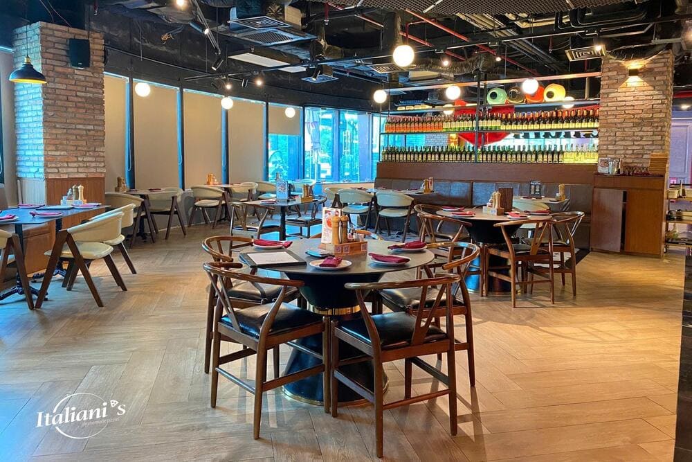 The restaurant features classic European styling with elegant design and refined interiors (Source: Italiani's Pizza)